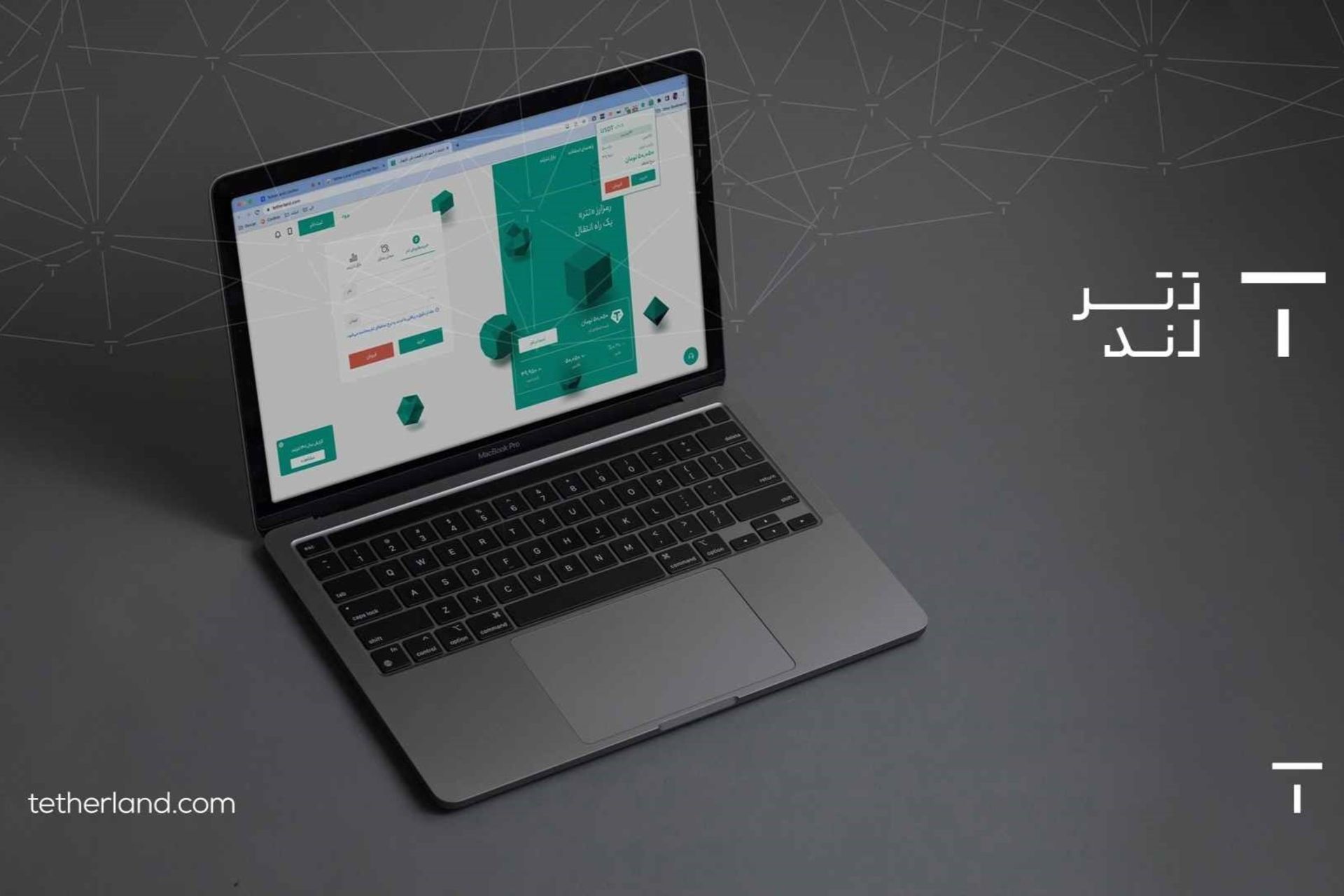 تترلند روی لپ تاپ در پس‌زمینه خاکستری