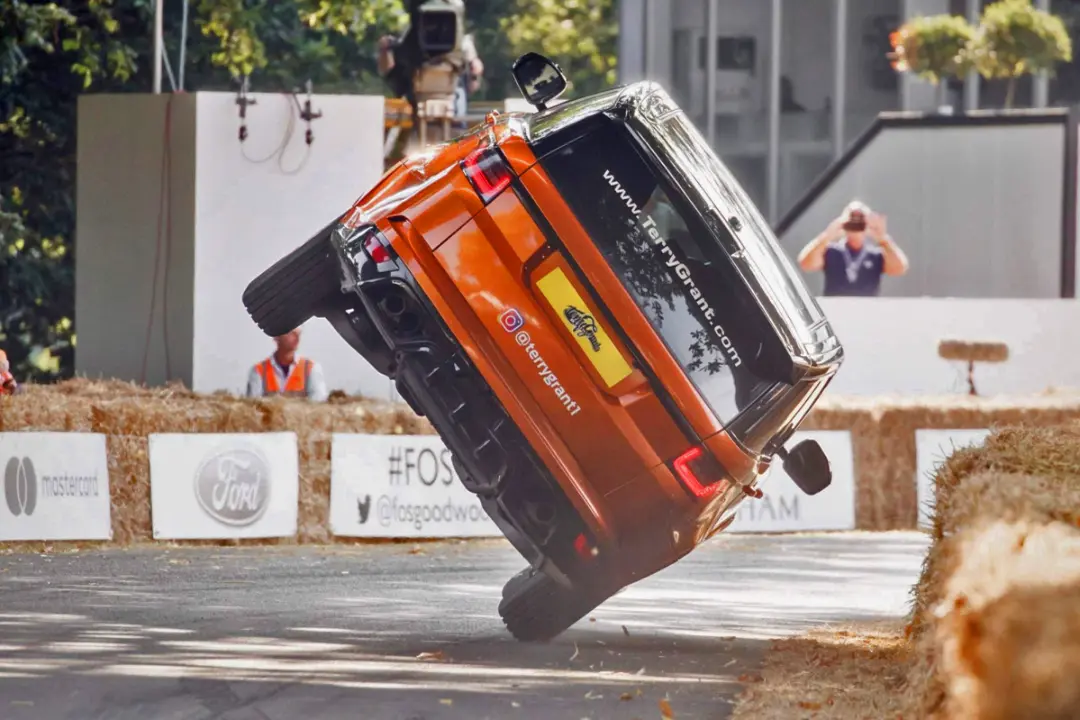 driving on two wheels   Range Rover