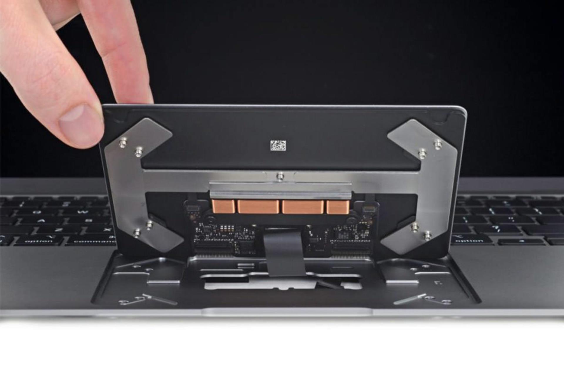 iFixit / مک‌بوک ایر /  پد لمسی