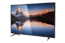 نمای نیم رخ تلویزیون ایکس ویژن 32XK570 مدل 32 اینچ با صفحه روشن و روی پایه