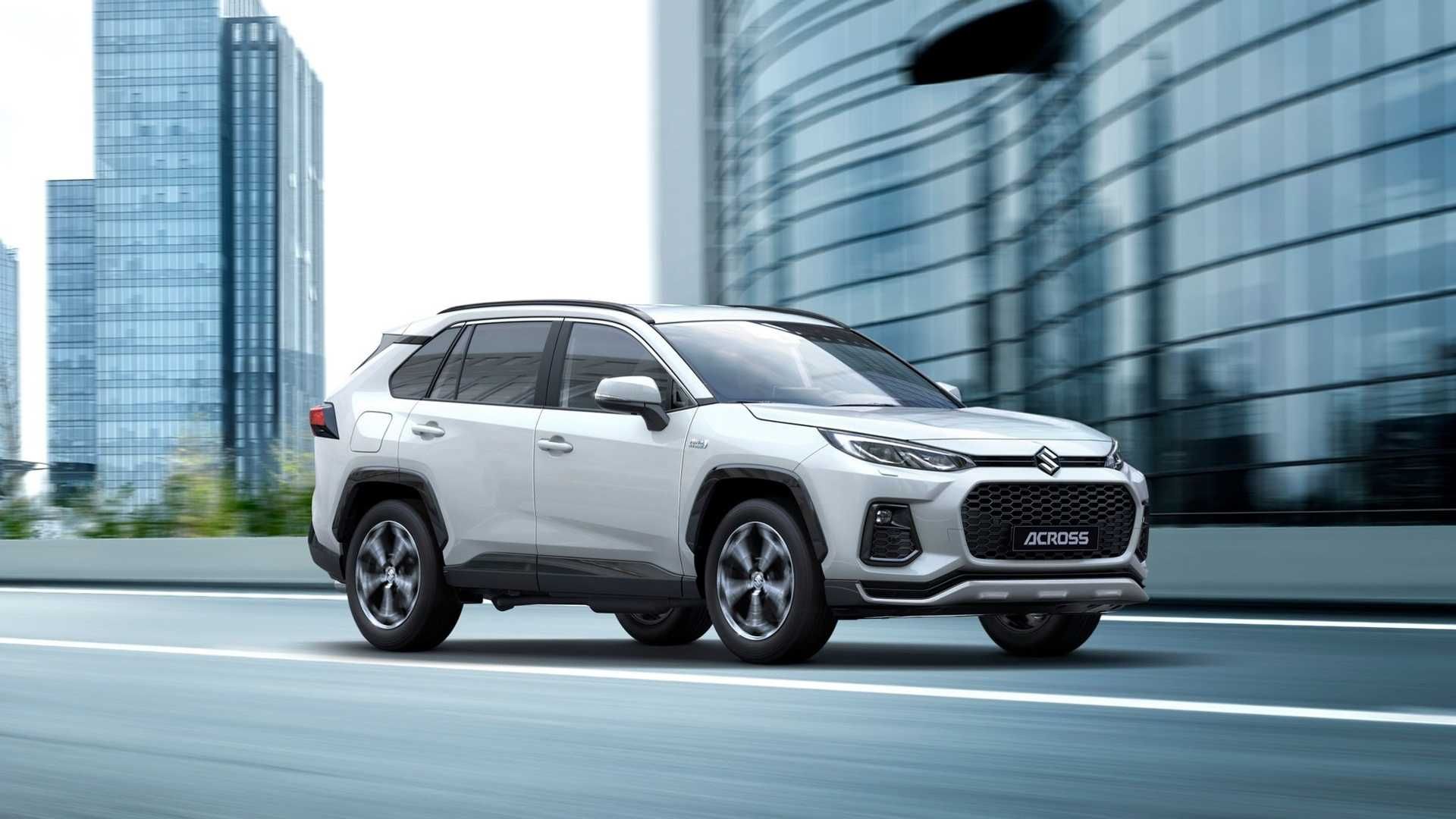 خودرو شاسی بلند سوزوکی اکراس / Suzuki Across سفید رنگ در کنار ساختمان 
