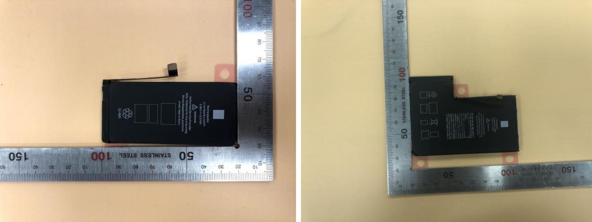 باتری گوشی آیفون 12 درحال اندازه گیری با خط کش