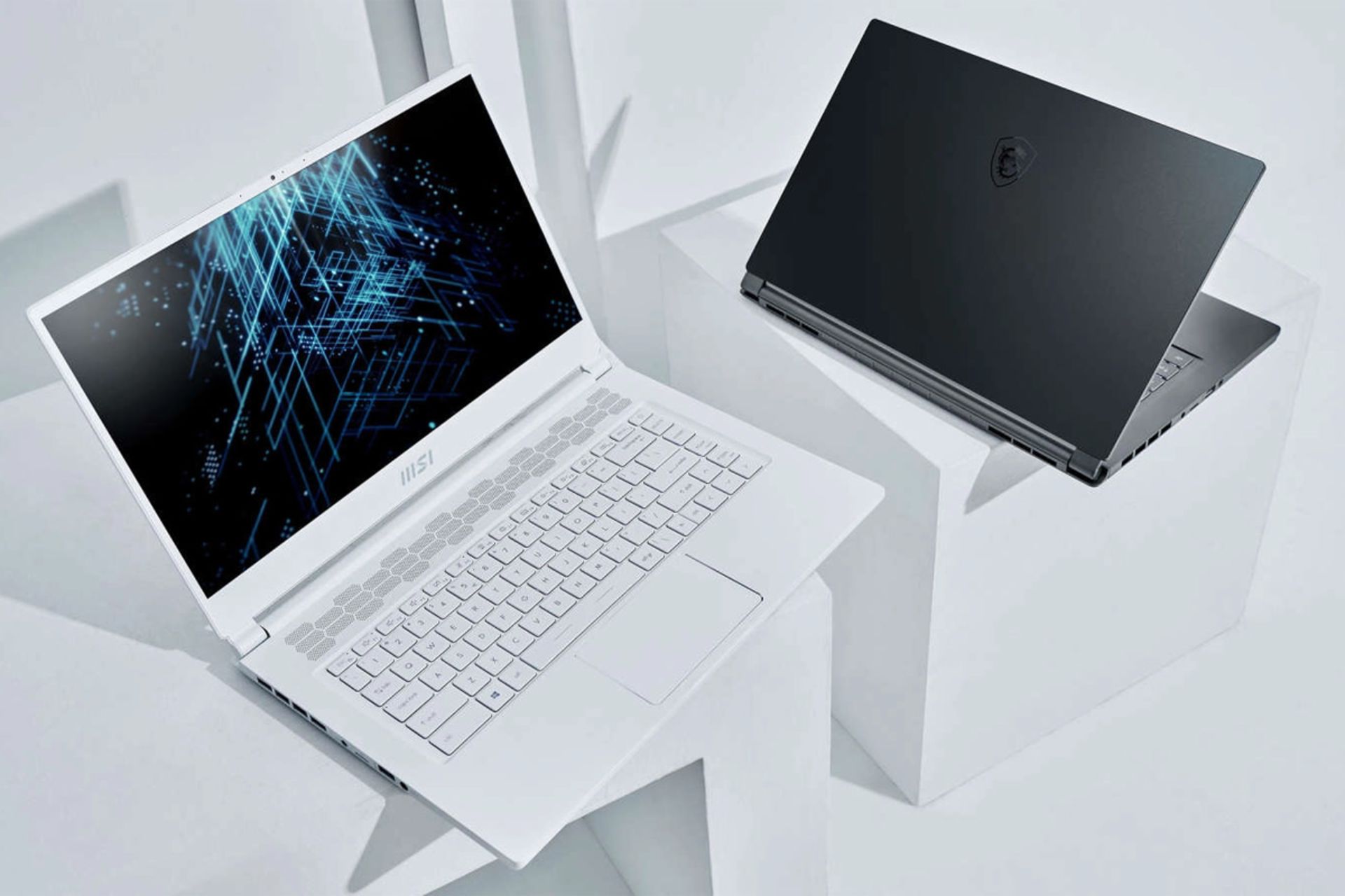 مرجع متخصصين ايران لپ تاپ MSI Stealth 15M در دو رنگ سفيد و مشكي