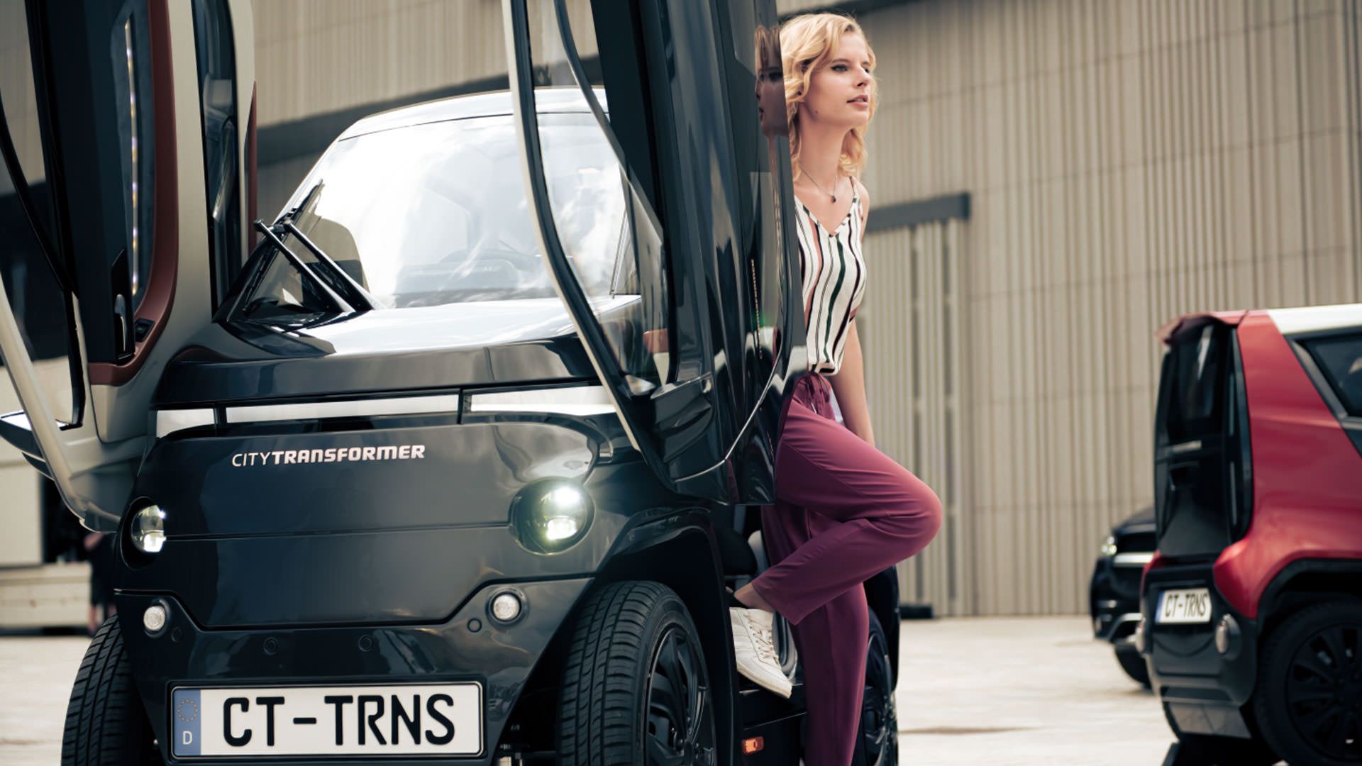 خودروی الکتریکی کوچک سیتی ترانسفورمر / City Transformer microcar با درهای باز