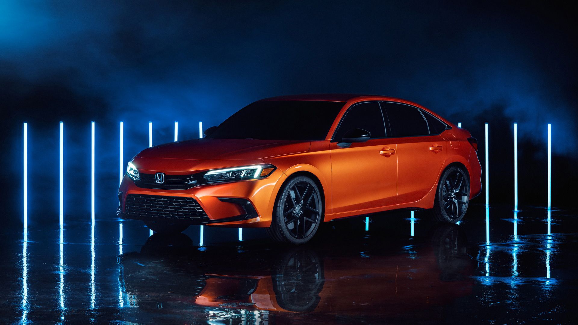 نمای سه چهارم جلو هوندا سیویک مدل 2022 / 2022 Honda Civic Sedan نارنجی رنگ