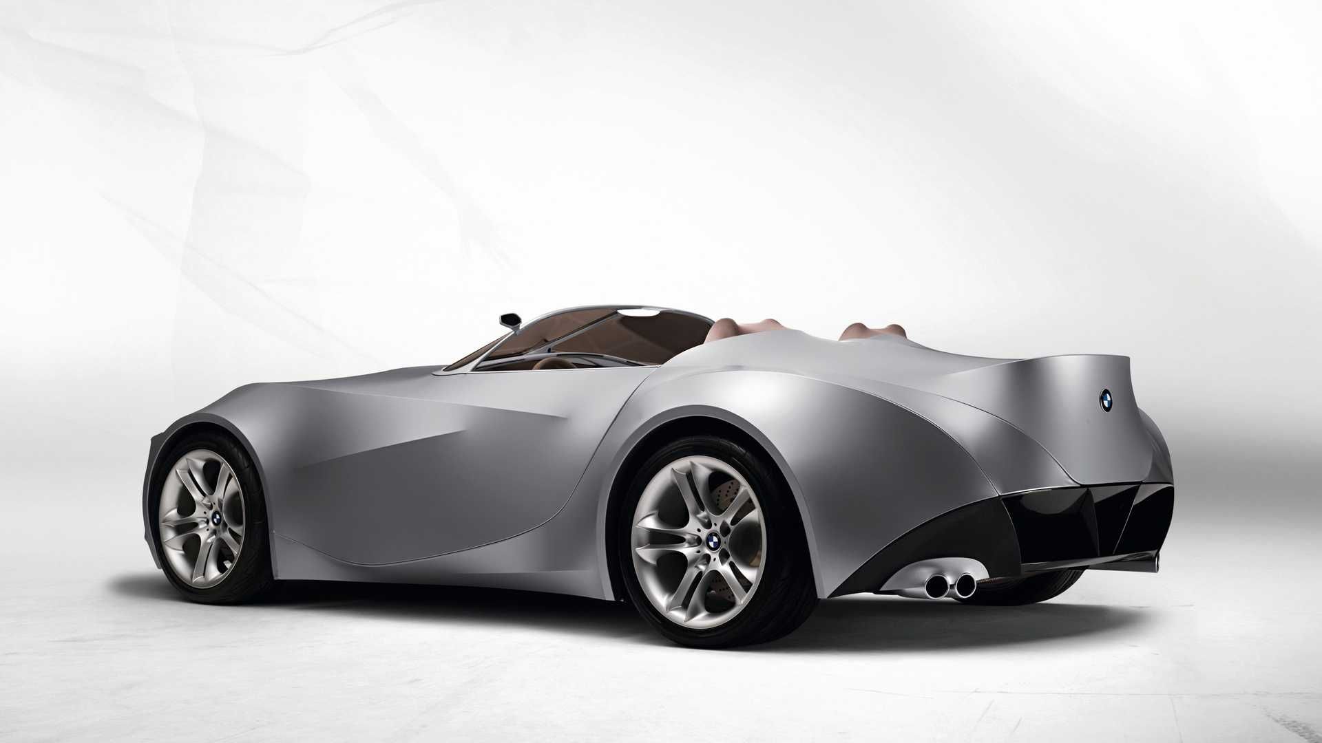 مرجع متخصصين ايران نماي سه چهارم عقب خودروي مفهومي روباز بي ام و گينا / BMW GINA concept convertible با بدنه پارچه اي 