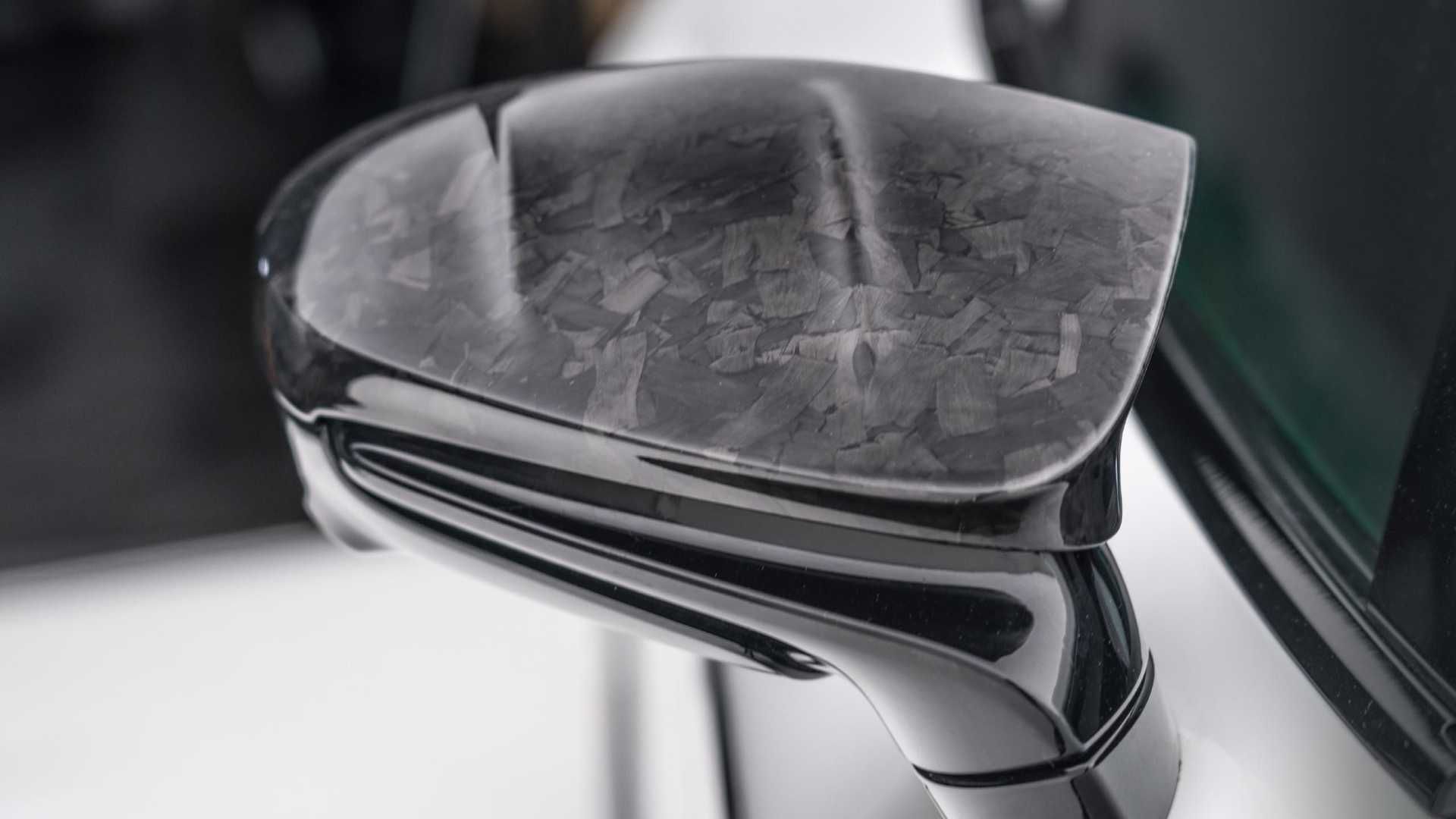 درپوش آینه جانبی پورشه تایکان تیونینگ منصوری / Mansory Porsche Taycan سفید رنگَ