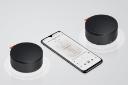 اسپیکر شیائومی Xiaomi Mi Portable Bluetooth Speaker Mini XMYX04WM کنار گوشی