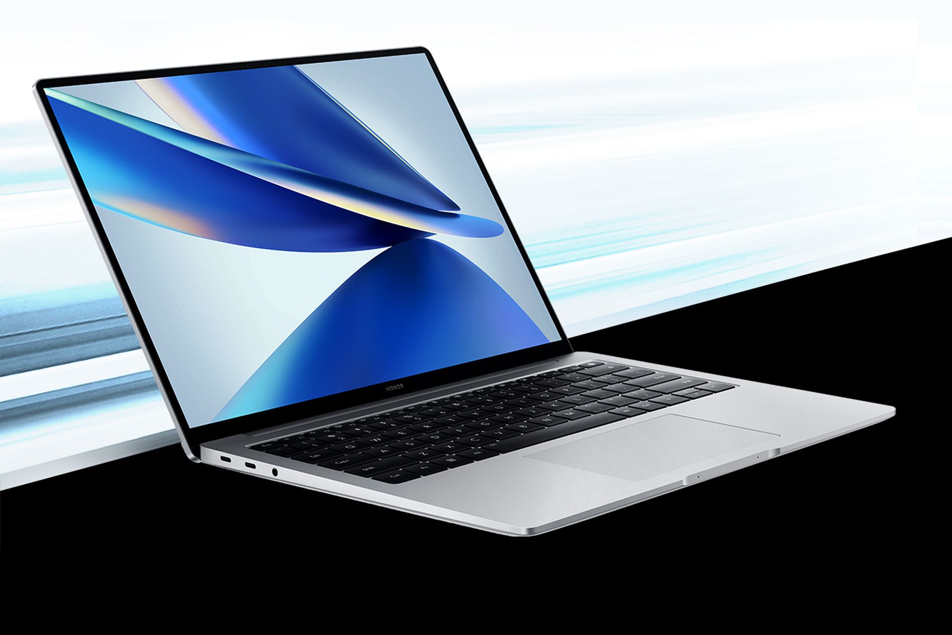 لپ تاپ آنر مجیک بوک 14 2022 در پس زمینه سفید و مشکی