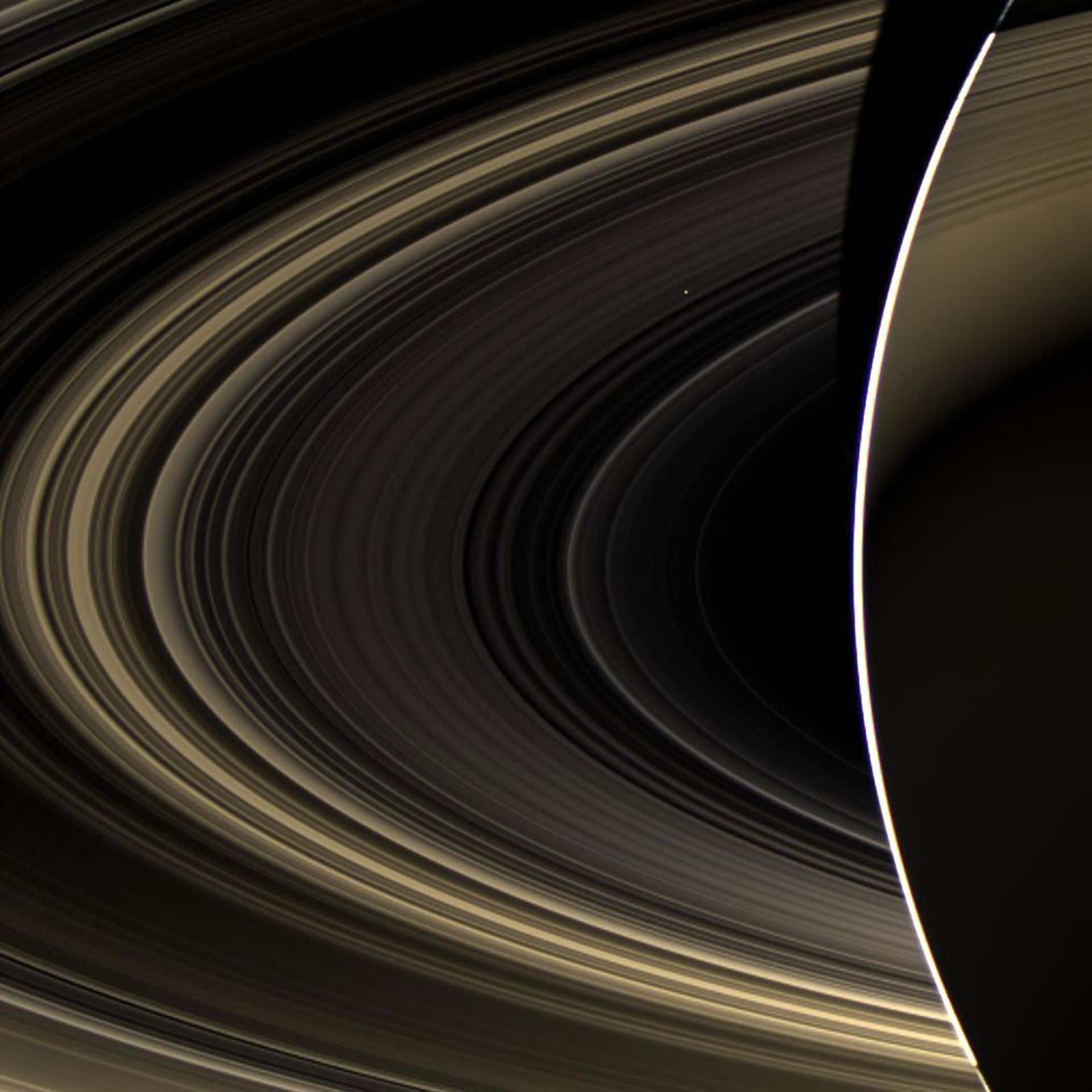 The Cassini probe has captured the image of Venus through the rings of Saturn.