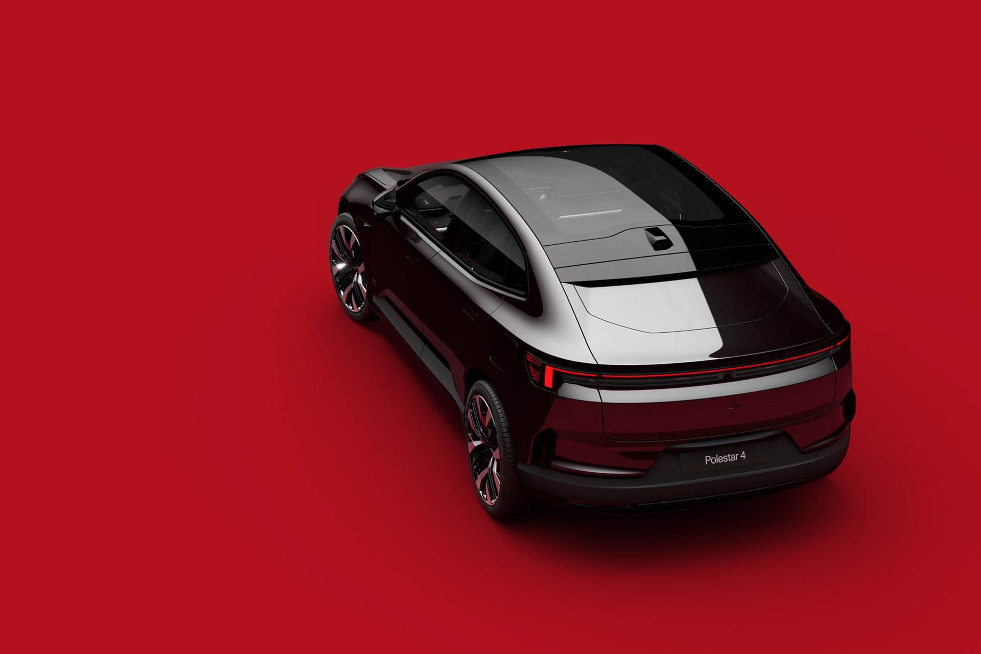 پولستار ۴ رنگ مشکی از نمای بالا پشت - پس‌زمینه قرمز