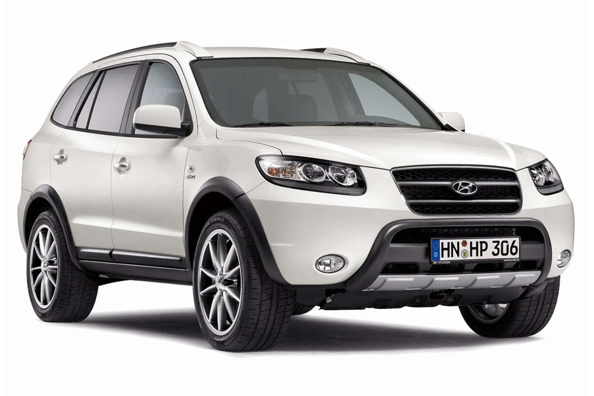 نمای نیم رخ چپ خودرو هیوندای سانتافه ۲۰۱۰ سفید با پس‌ زمینه سفید/ Hyundai Santa Fe 2010