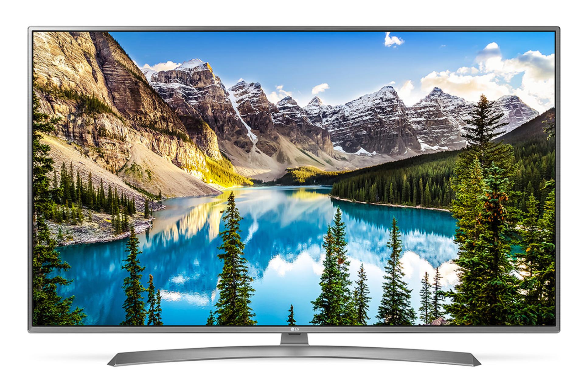 نمای جلو تلویزیون ال جی UJ6900 مدل 49 اینچ با بدنه نقره ای و صفحه روشن با نمایش منظره