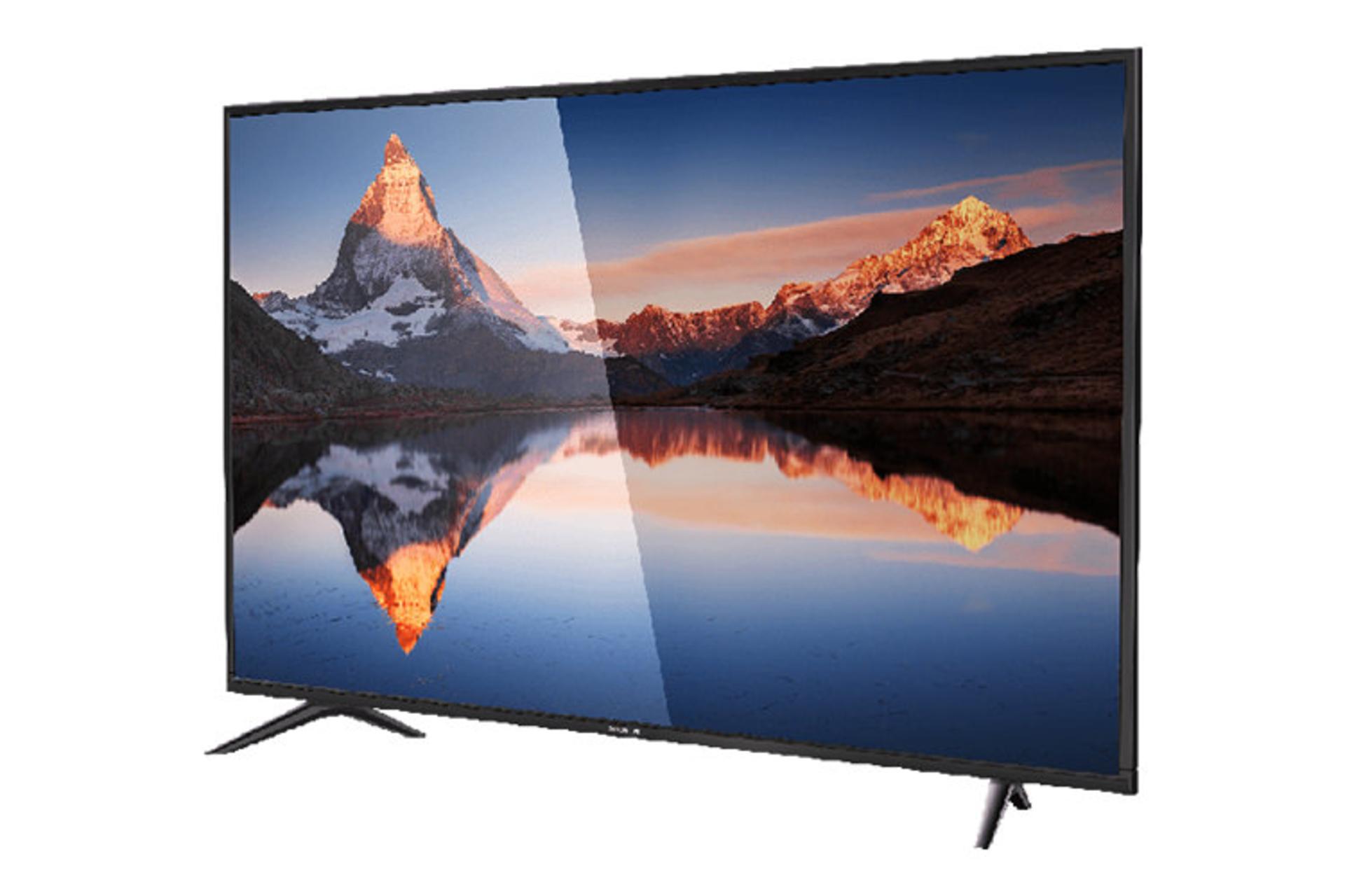 نمای نیم رخ تلویزیون ایکس ویژن 32XK570 مدل 32 اینچ با صفحه روشن و روی پایه