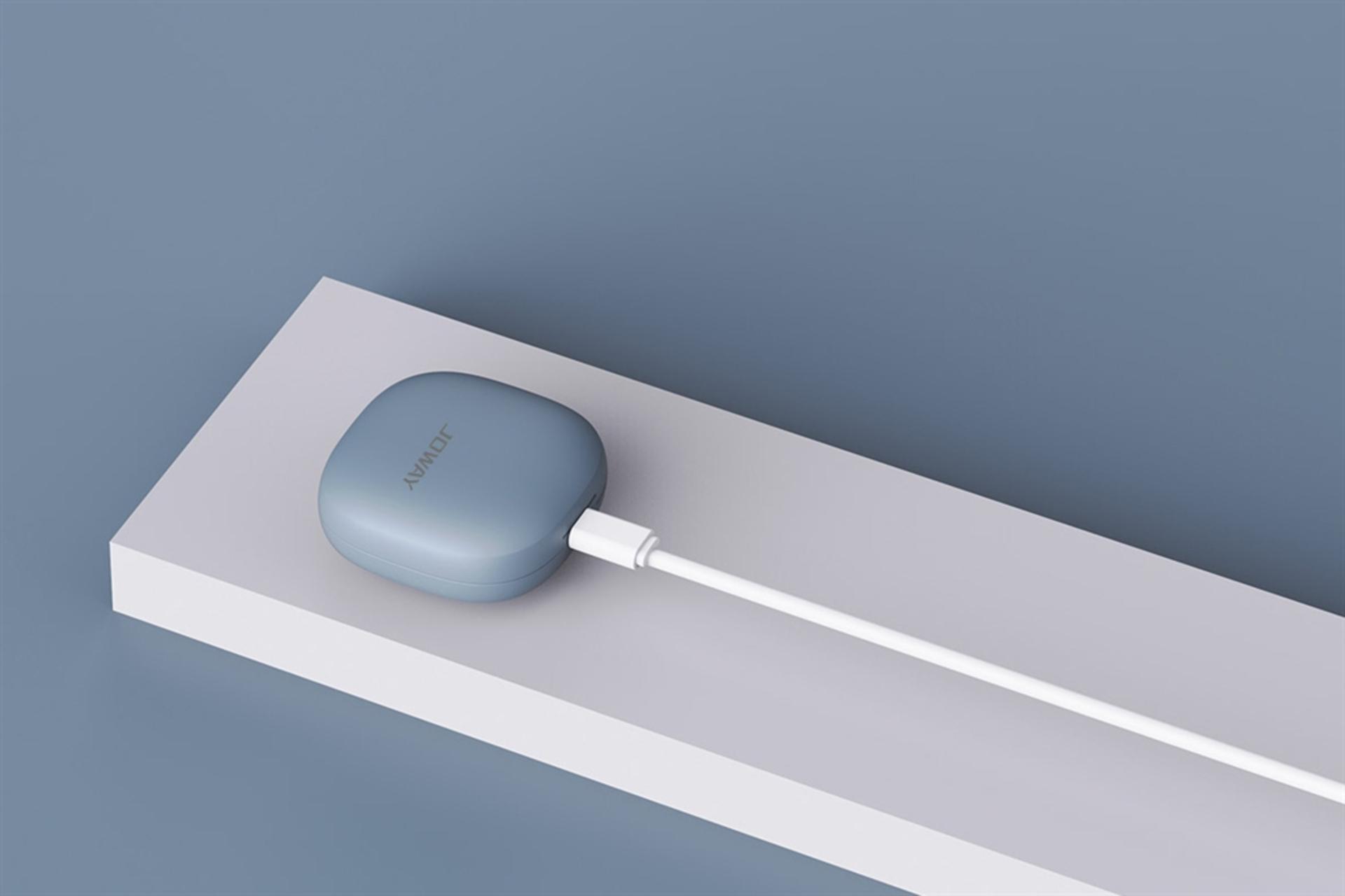 ایرباد بی سیم جووی Joway H130 در حال شارژ