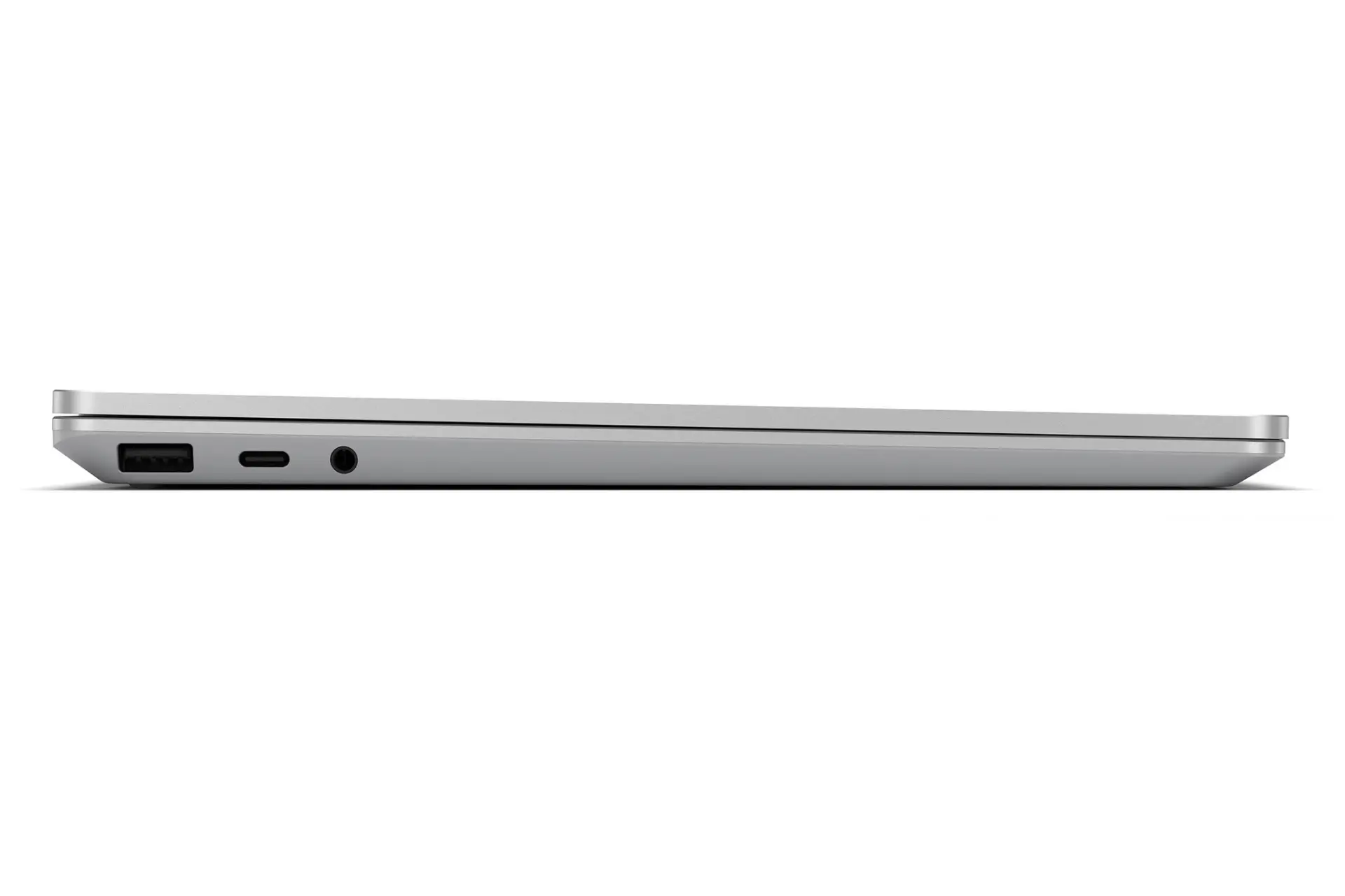 نمای کنار مایکروسافت سرفیس لپ تاپ گو رنگ سیلور در حالت بسته