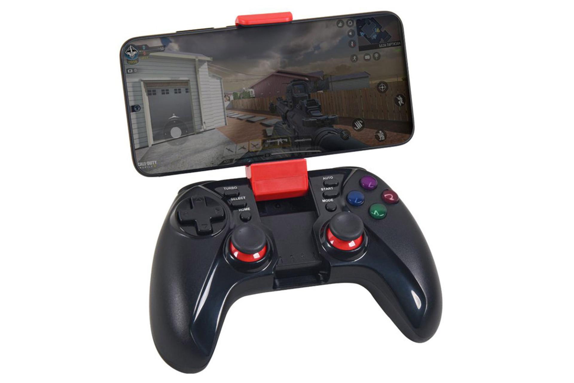 دسته بازی تسکو TSCO TG 145 متصل شده به گوشی هوشمند