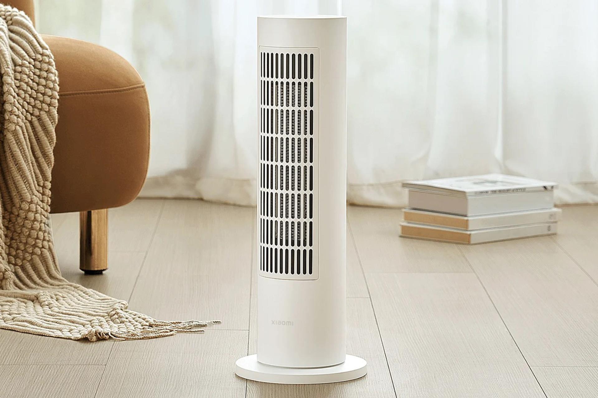 ابعاد بخاری برقی شیائومی Xiaomi LSNFJ02LX کنار مبل