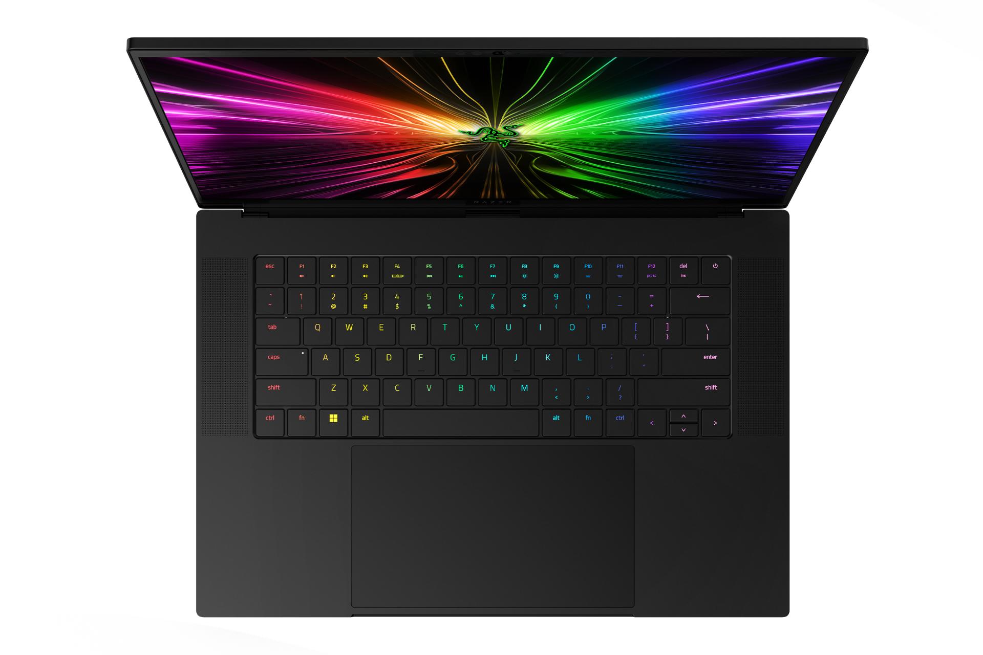 نمای بالای لپ تاپ بلید 16 ریزر با تمرکز روی ترک‌پد و نورپردازی کیبورد رنگ مشکی