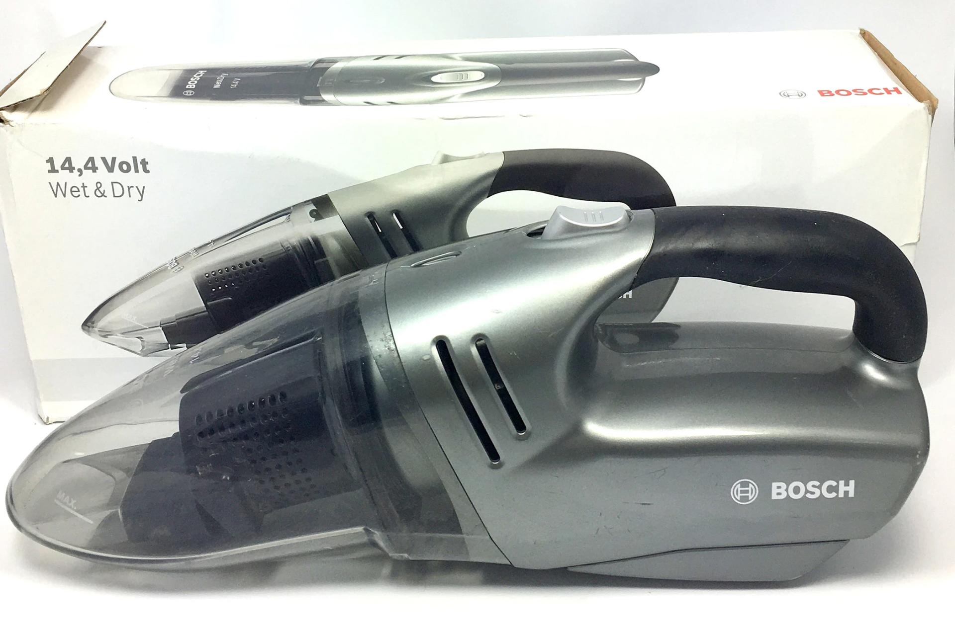 جاروی شارژی دستی بوش مدل BKS 4043‏ در کنار جعبه بسته بندی