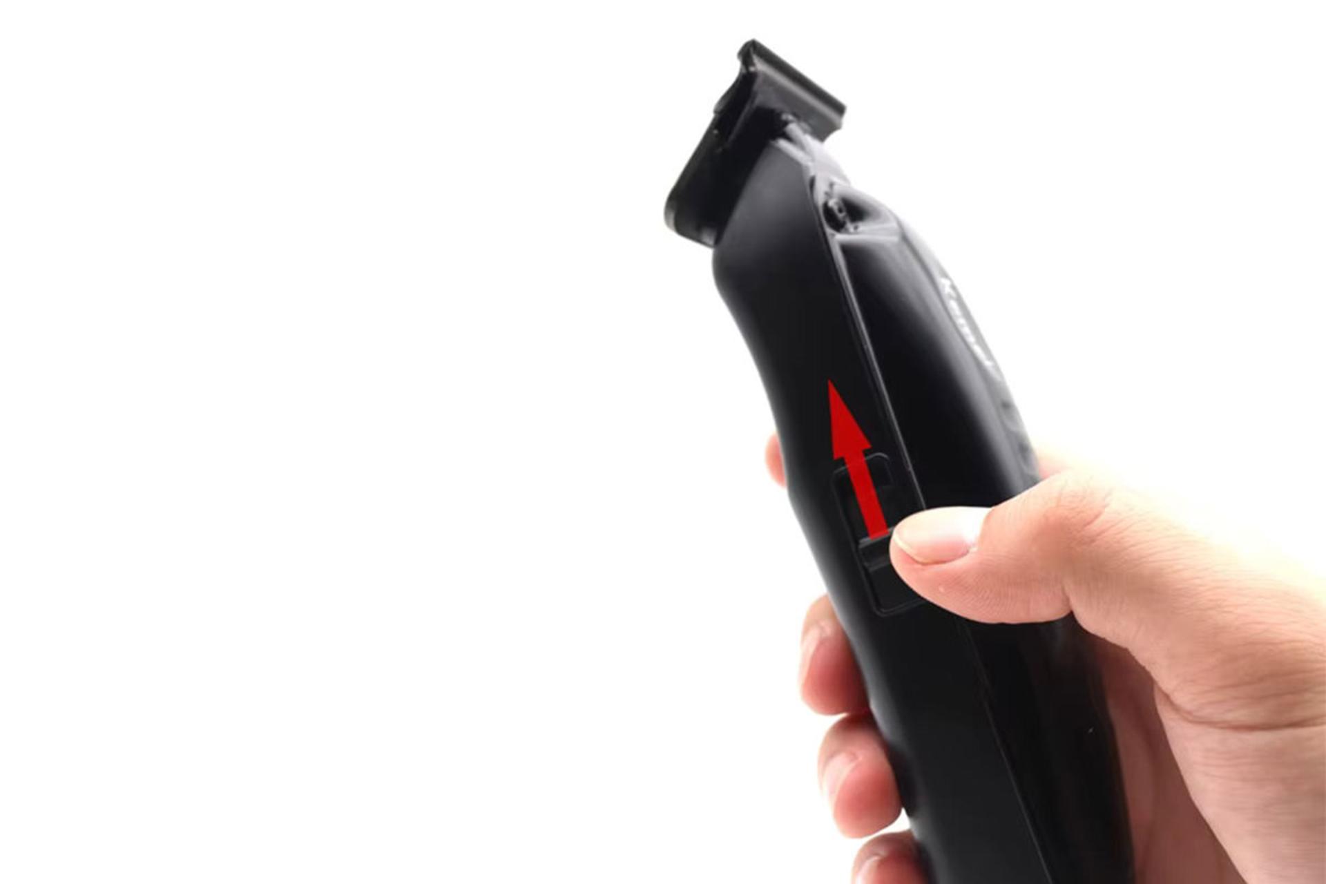 ماشین اصلاح و ریش تراش کیمی Kemei KM-1578 نمای دکمه روشن و خاموش