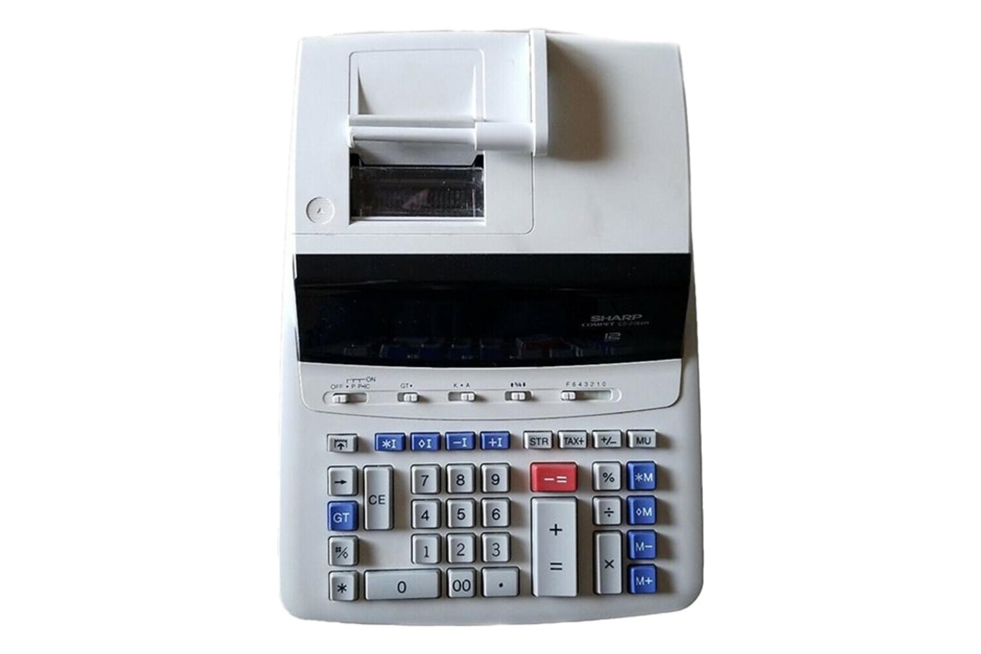 نمای بالای ماشین حساب شارپ CS-2194H با نمایش صفحه کلید، چاپگر و نمایشگر