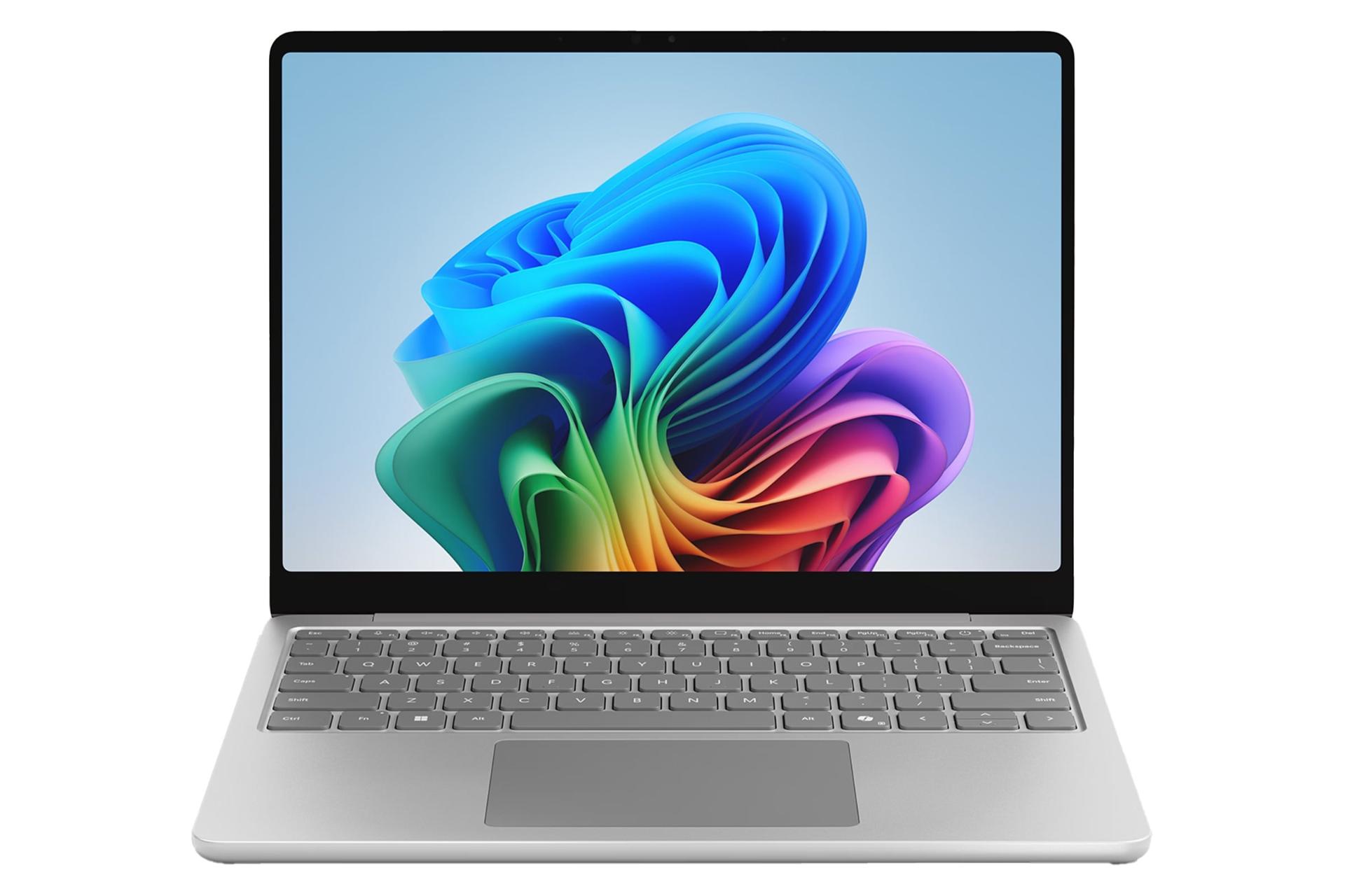 نمای روبه‌روی لپ تاپ سرفیس لپ تاپ 7 مایکروسافت نسخه 13 اینچ با نمایشگر روشن و نمایش کیبورد و ترک‌پد رنگ پلاتینیومی