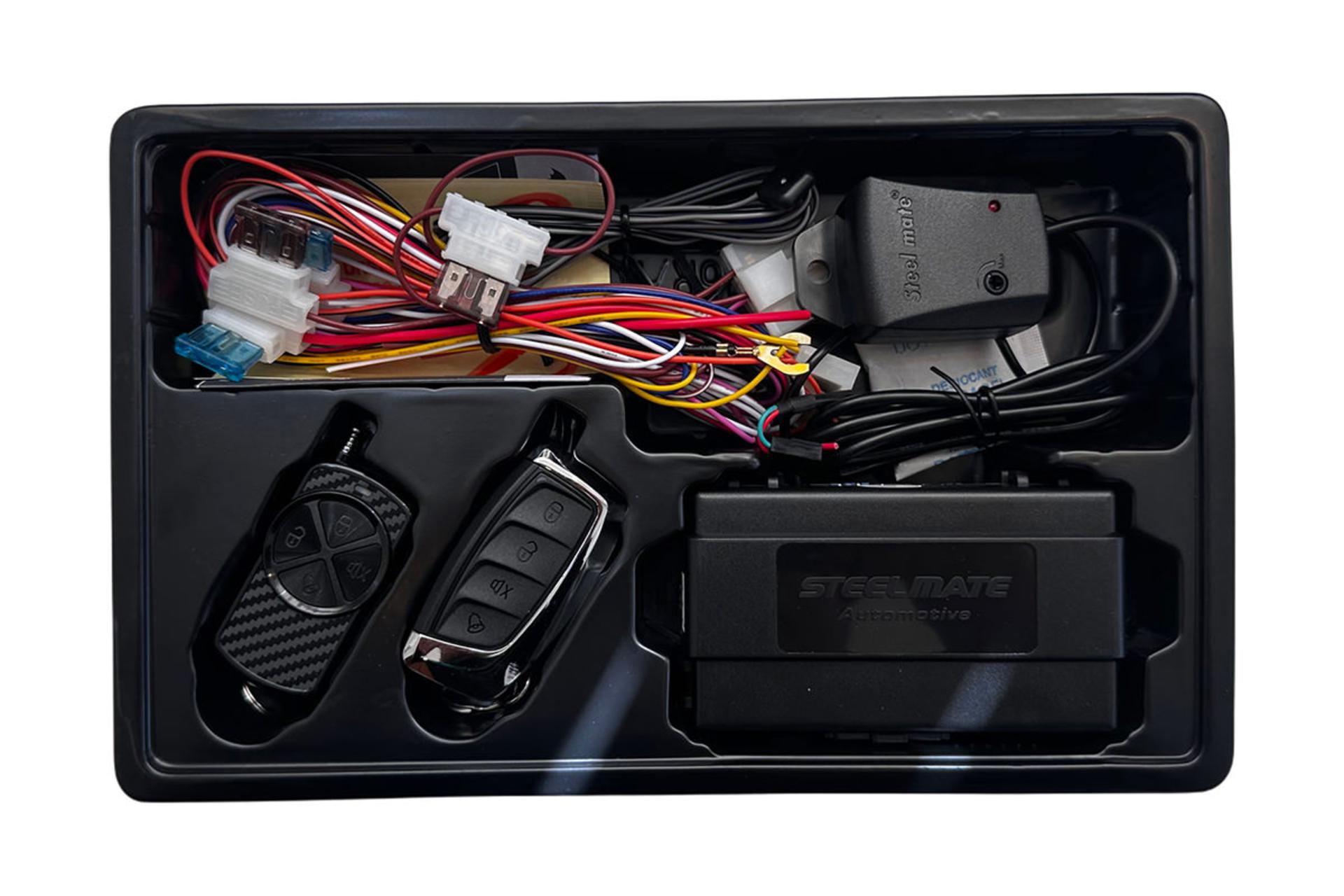 دزدگیر خودرو استیل میت Steel Mate RX1000 REDBAT 007 نمای قطعات داخل جعبه و بسته بندی
