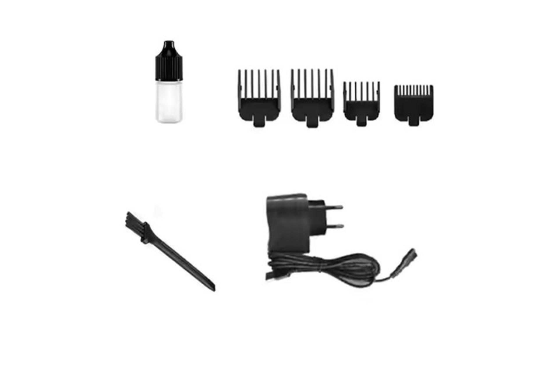 ماشین اصلاح کیمی Kemei KM-1997 نمای شانه ها و لوازم همراه