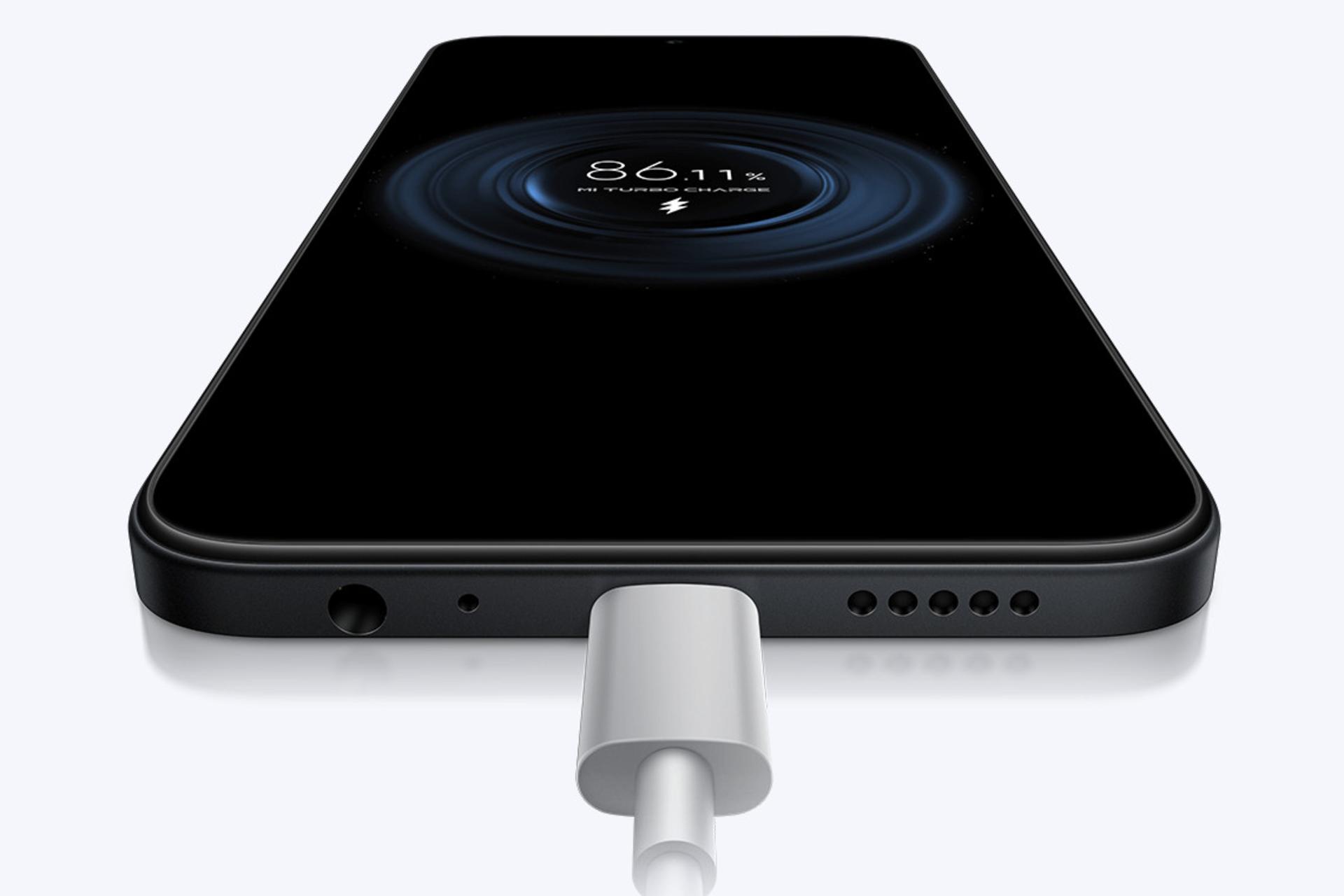 گوشی موبایل پوکو C85 شیائومی 4G مشکی در حال شارژ / Xiaomi Poco C85 4G