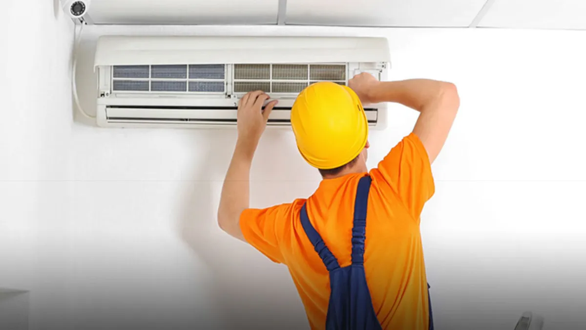 Expert person repairing air conditioner