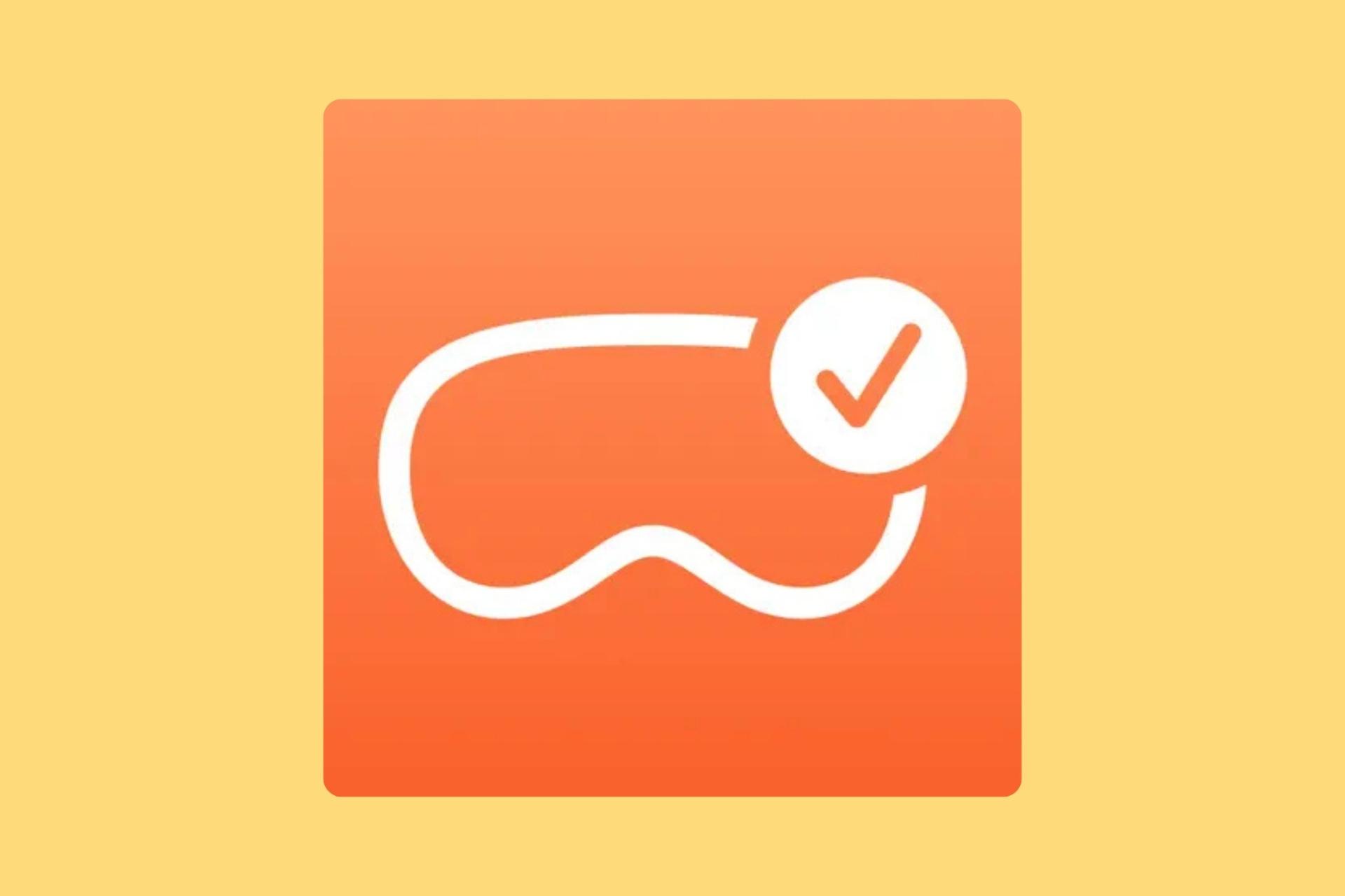 نماد هدست ویژن پرو اپل درون حاشیه‌ی نارنجی‌رنگ