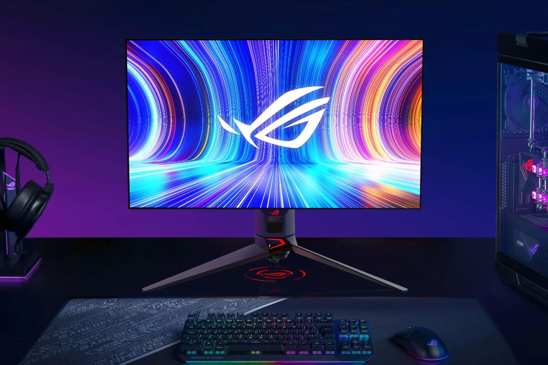 مانیتور ایسوس ROG Swift OLED PG27AQDM روی میز با کیبورد و ماوس