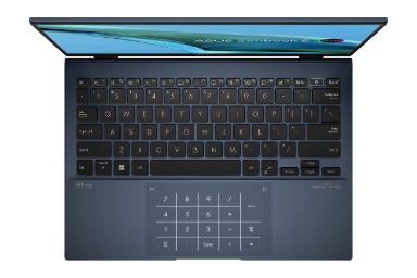 نمای بالای لپ تاپ Zenbook S 13 OLED UM5302 ایسوس با تمرکز روی کیبورد و ترک‌پد رنگ آبی
