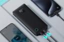 ابعاد پاور بانک باسئوس Baseus Airpow Lite 10000mAh 15W در کنار موبایل