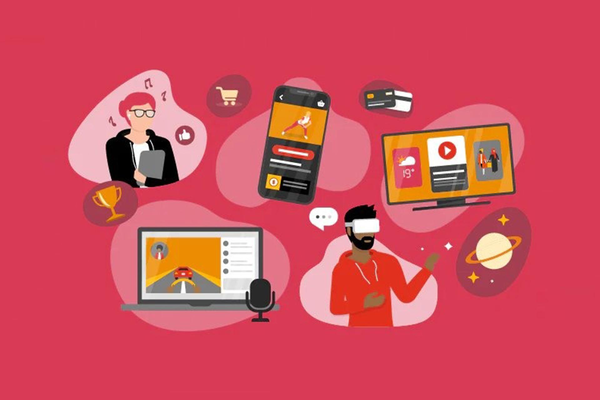 تصویر یک مرد و یک زن با پس زمینه صورتی در کنار دو مانیتور و یک گوشی موبایل