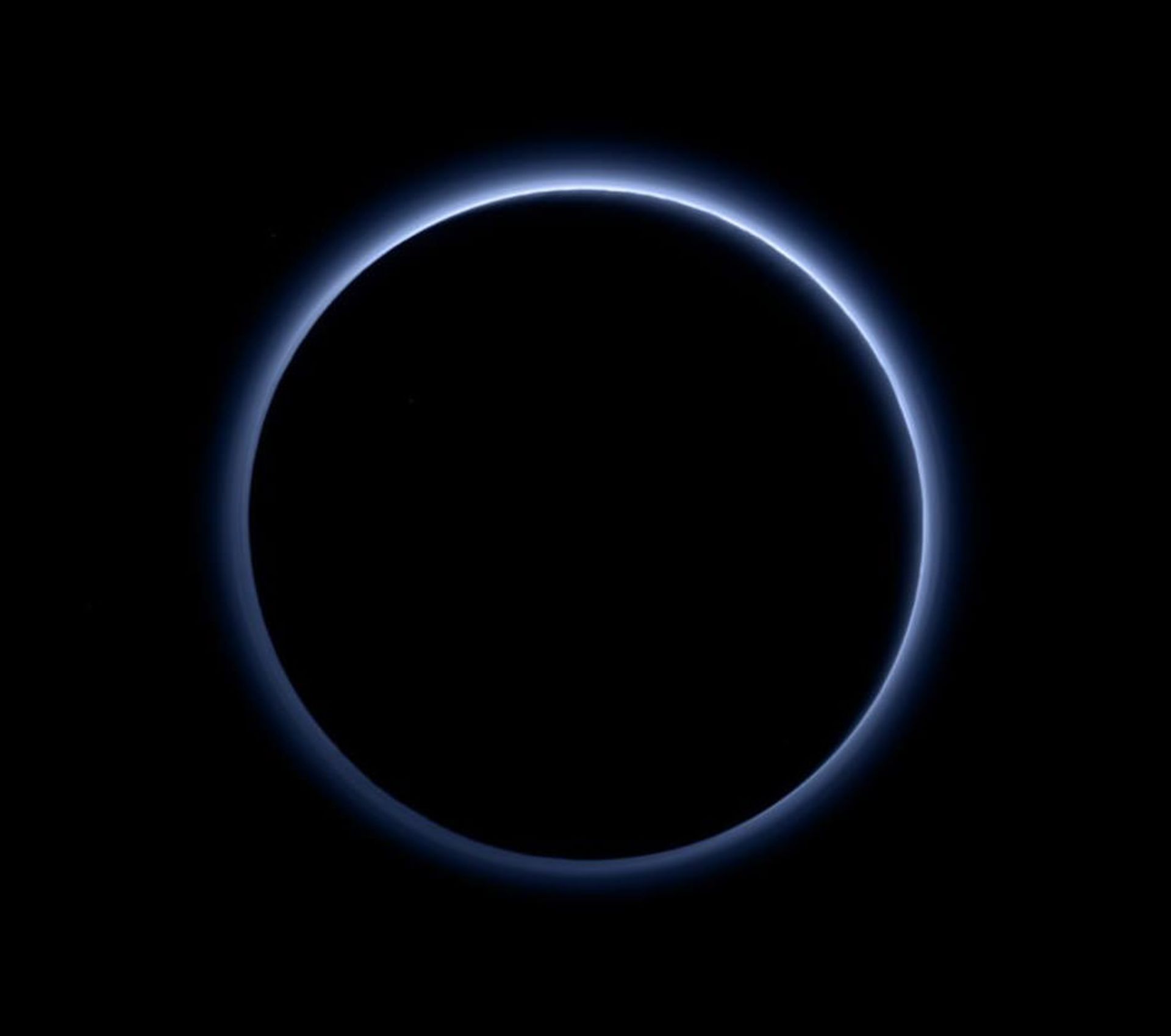 Blue haze surrounding the dwarf planet Pluto