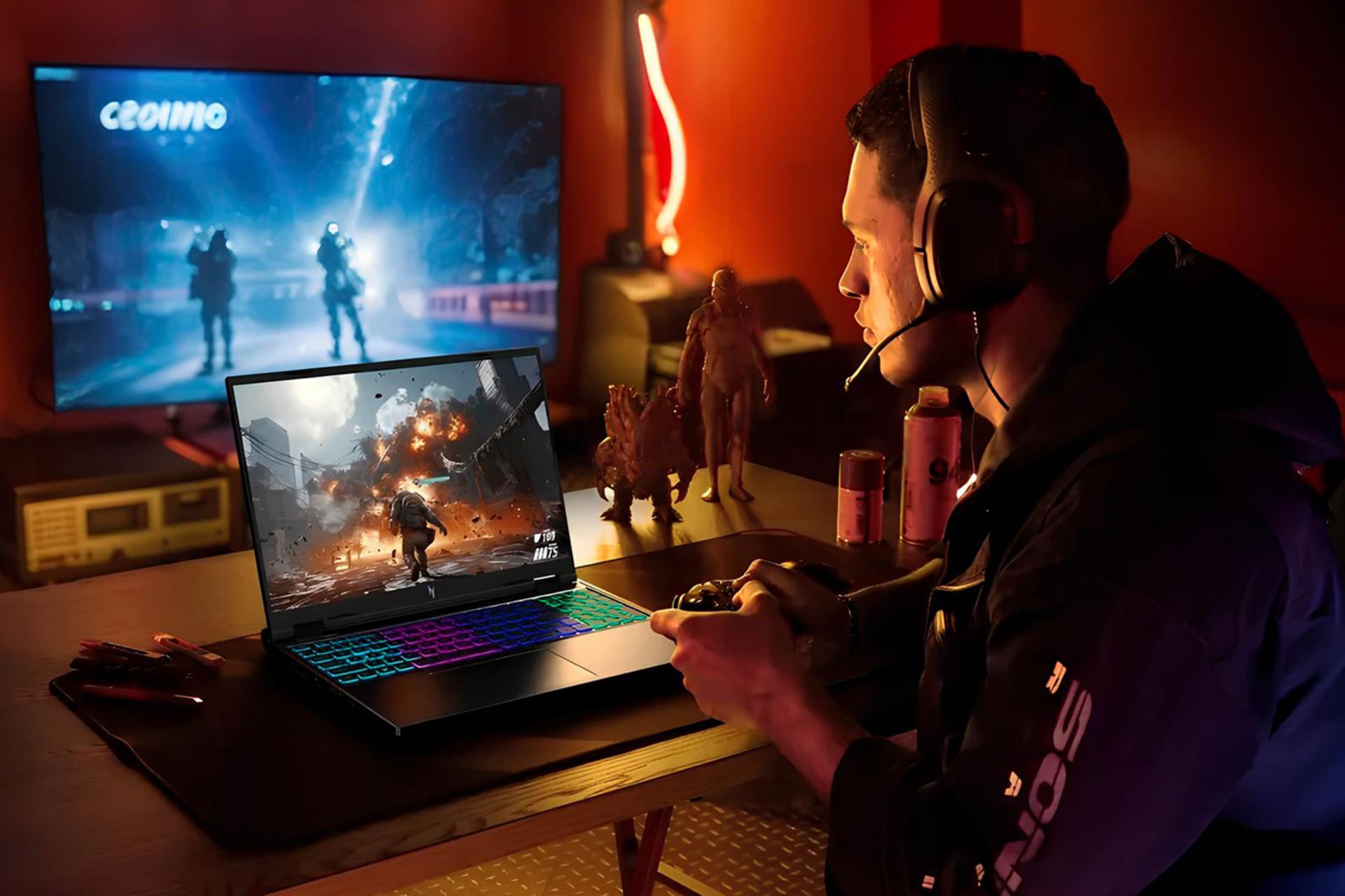 پسر در حال بازی با لپ تاپ گیمینگ ایسر