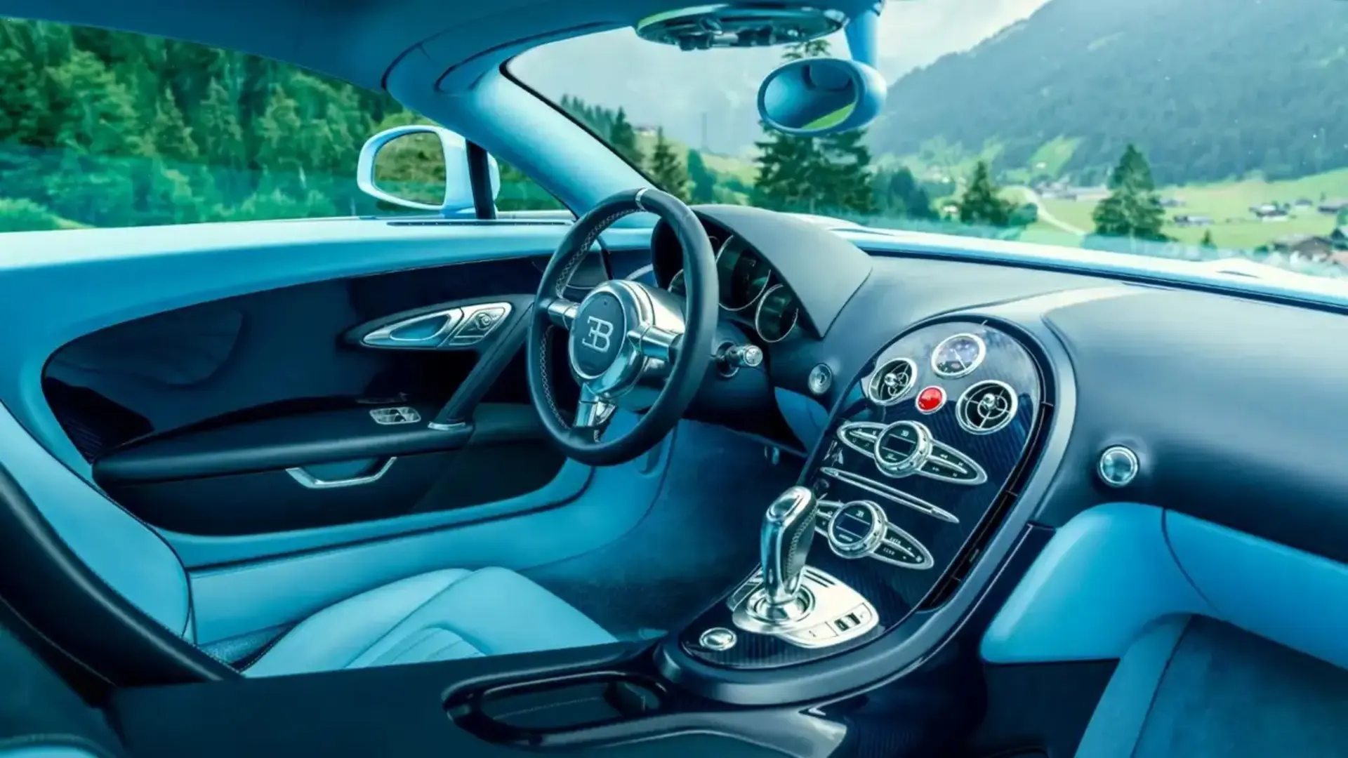نمای داخلی و داشبورد خودروی لوکس بوگاتی ویرون (Bugatti Veyron) با طراحی آبی