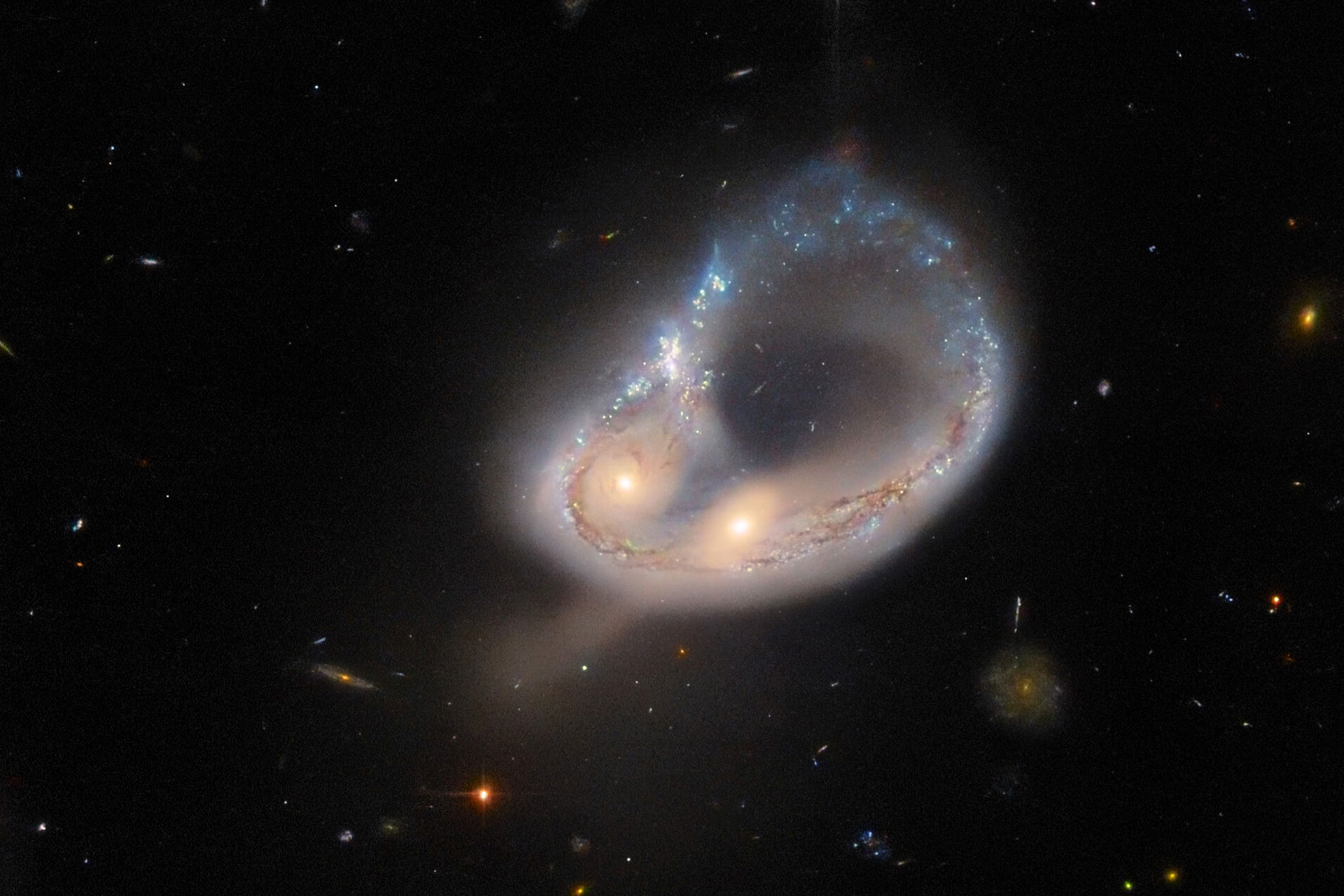 colliding galaxies 63c5153bec192cab95aad579