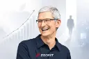 تیم کوک (Tim Cook) در کنار نمودار رشد و لوگوی اپل