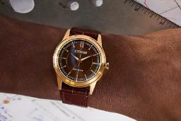 ساعت مچی سیتیزن مدل Rolan AW2113-16X با صفحه قهوه‌ای و بند چرمی