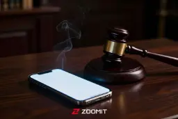 چکش دادگاه در کنار گوشی هوشمند در حال دود کردن