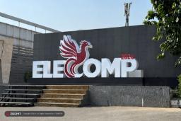 لوگوی نمایشگاه ELECOMP 2026 با نماد ققنوس قرمز و متن سفید