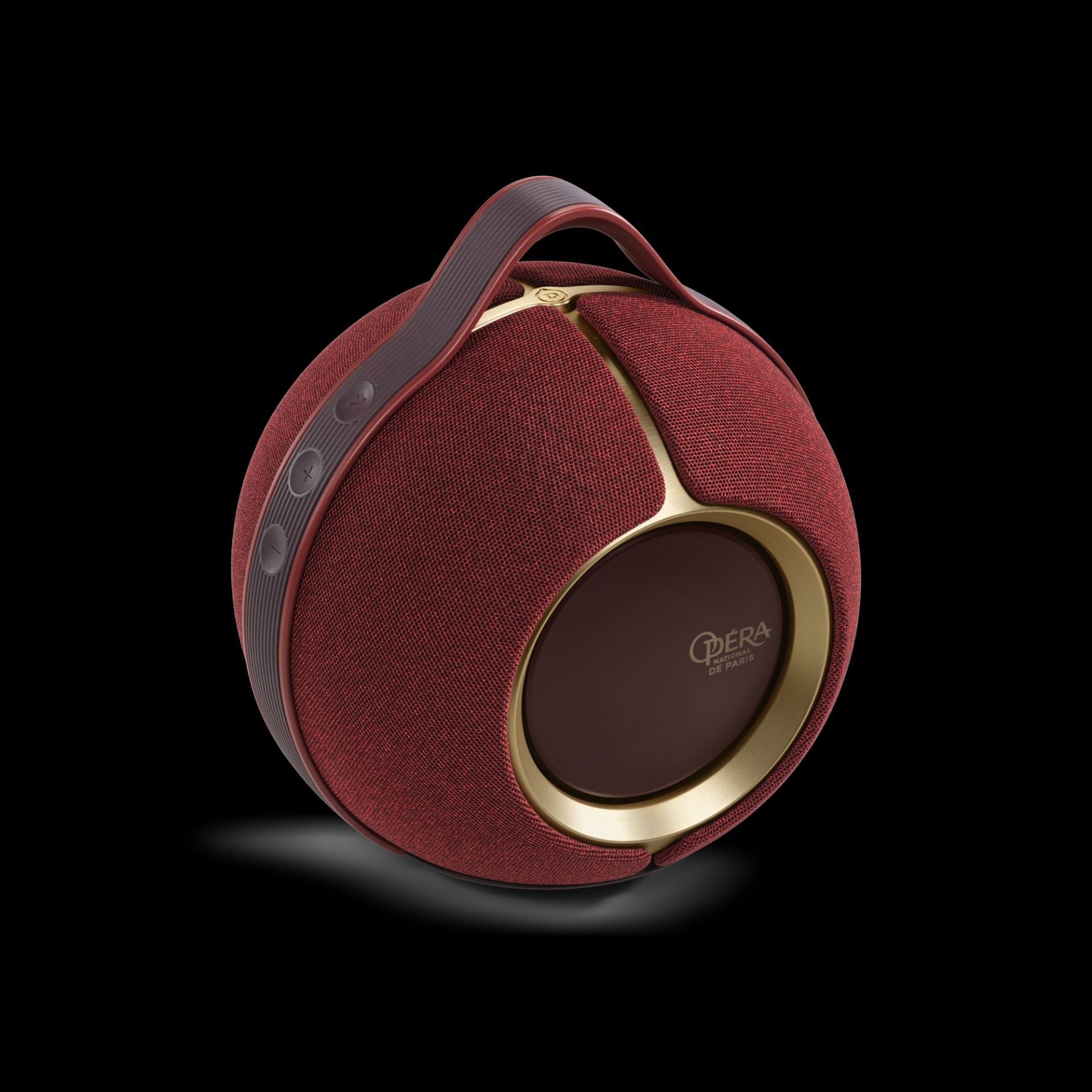 اسپیکر دایره‌ای با روکش قرمز و طلای ۲۴ عیار نمای بالا