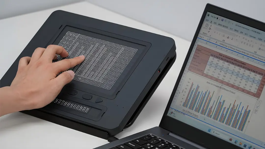 نمایشگر گرافیک لمسی Dot Pad (Dot Pad) در حال نمایش داده‌های نموداری برای افراد نابینا