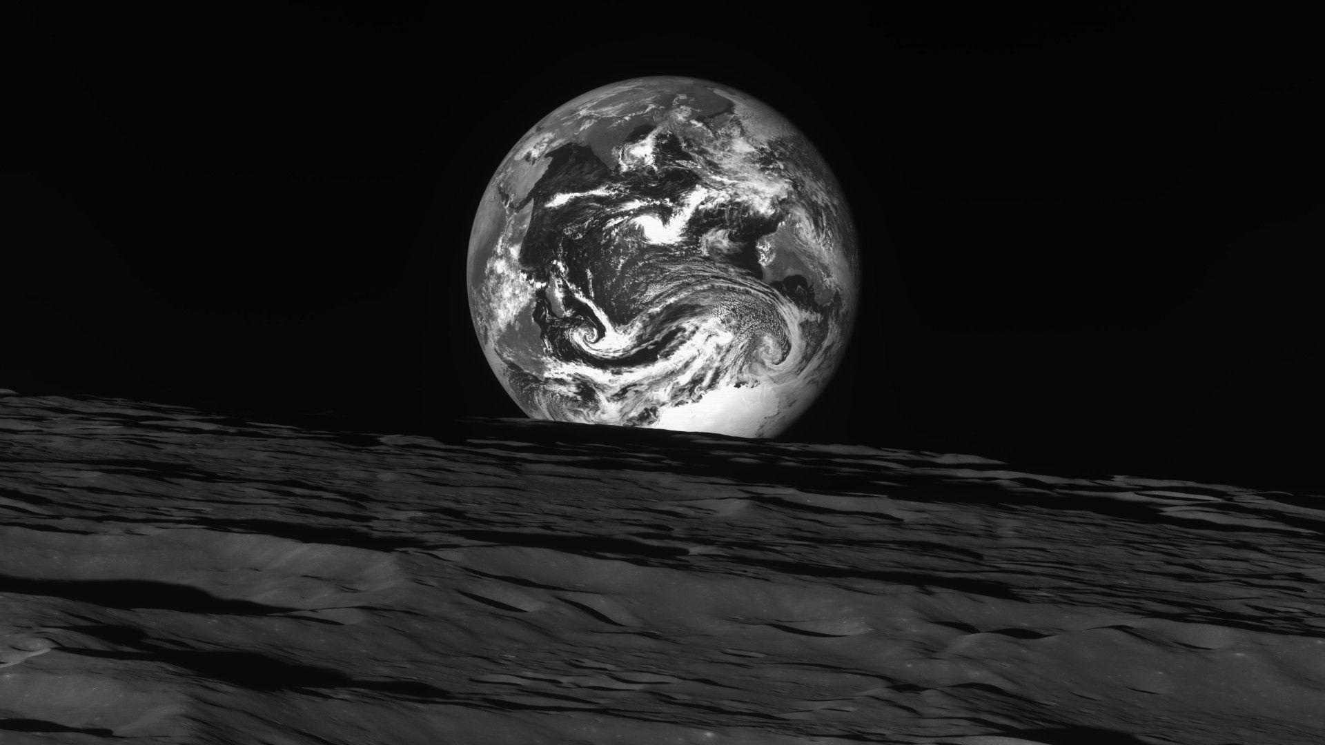 Earth rising from the moon