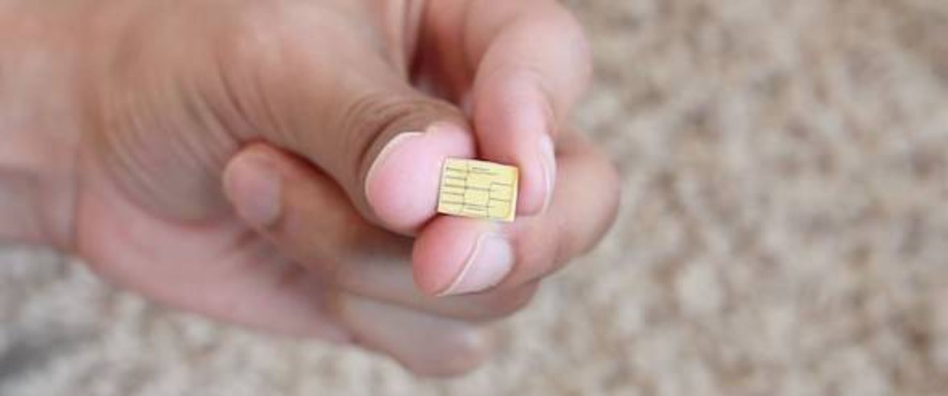 Convert-Micro-SIM-to-Nano-in-Hands-e1347657119472