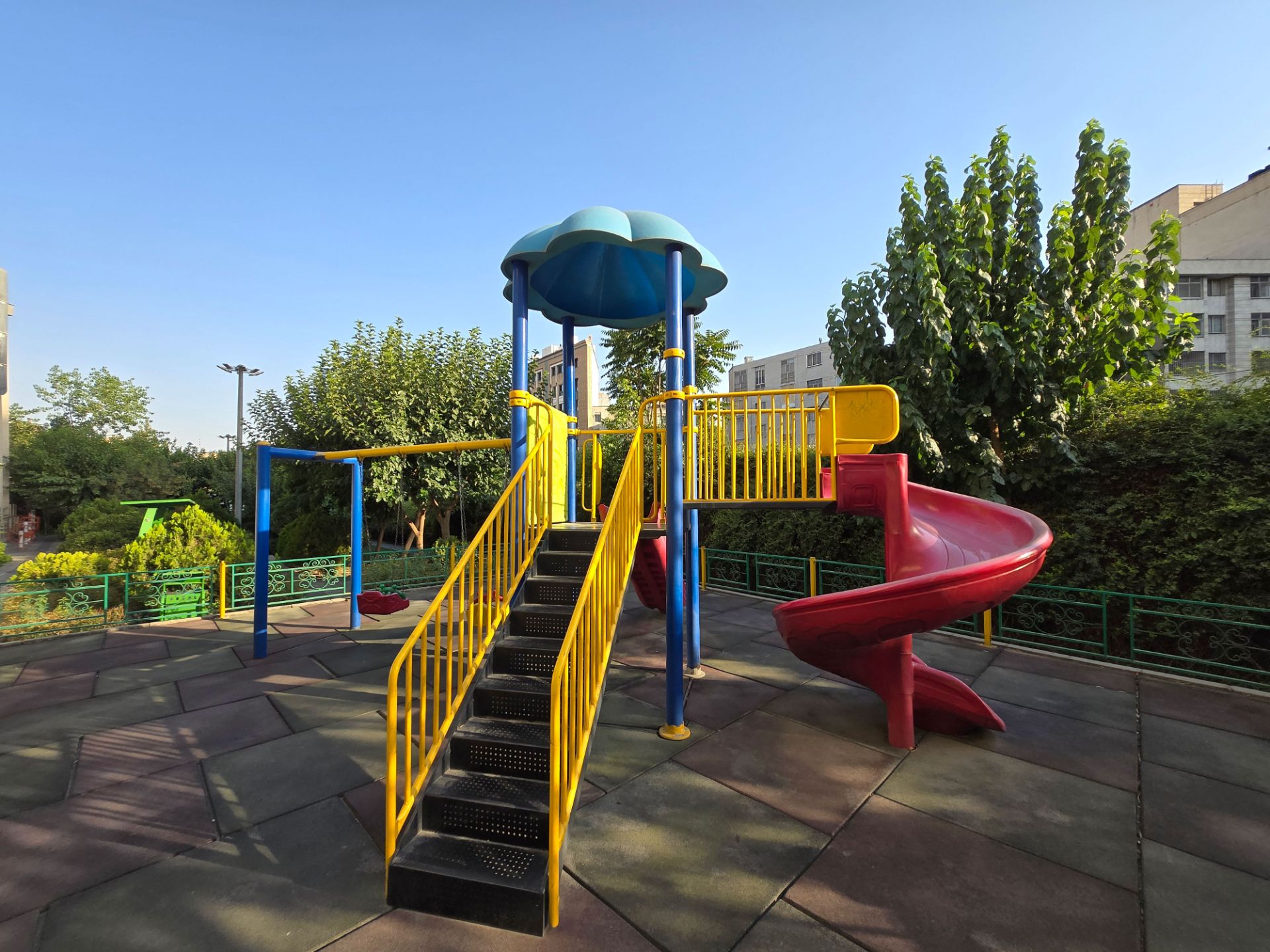 Colorful swings and slides in the park