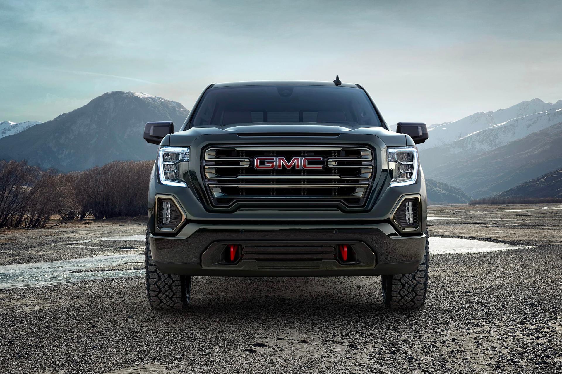 ماشین GMC Sierra جنرال موتورز نمای جلو آسمان ابری کوه
